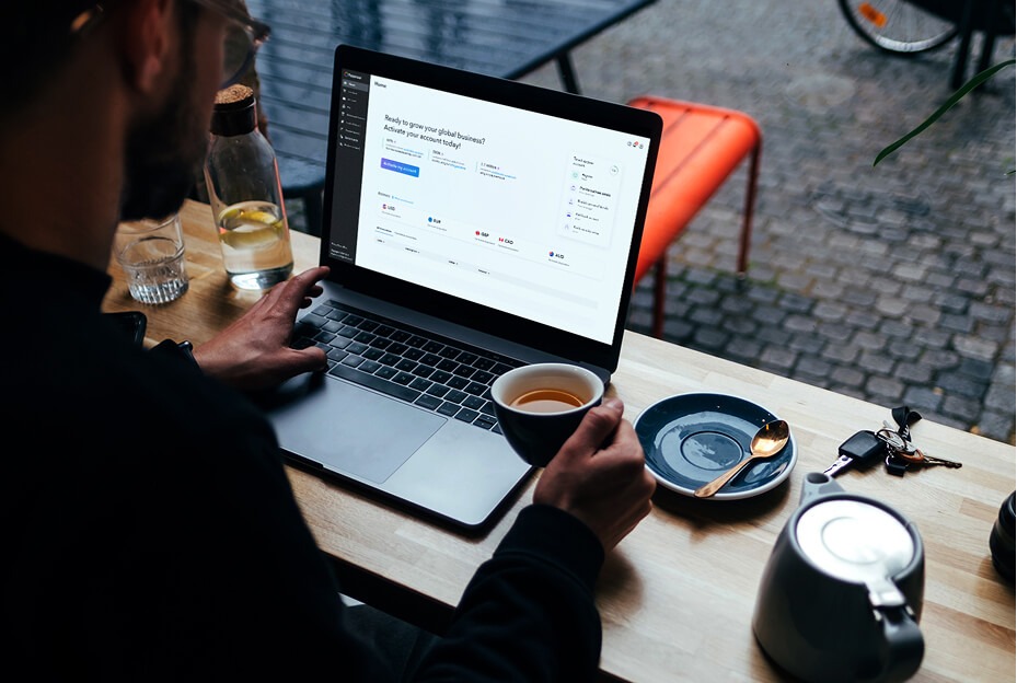 Payoneer account interface on a laptop, from the company’s media assets.